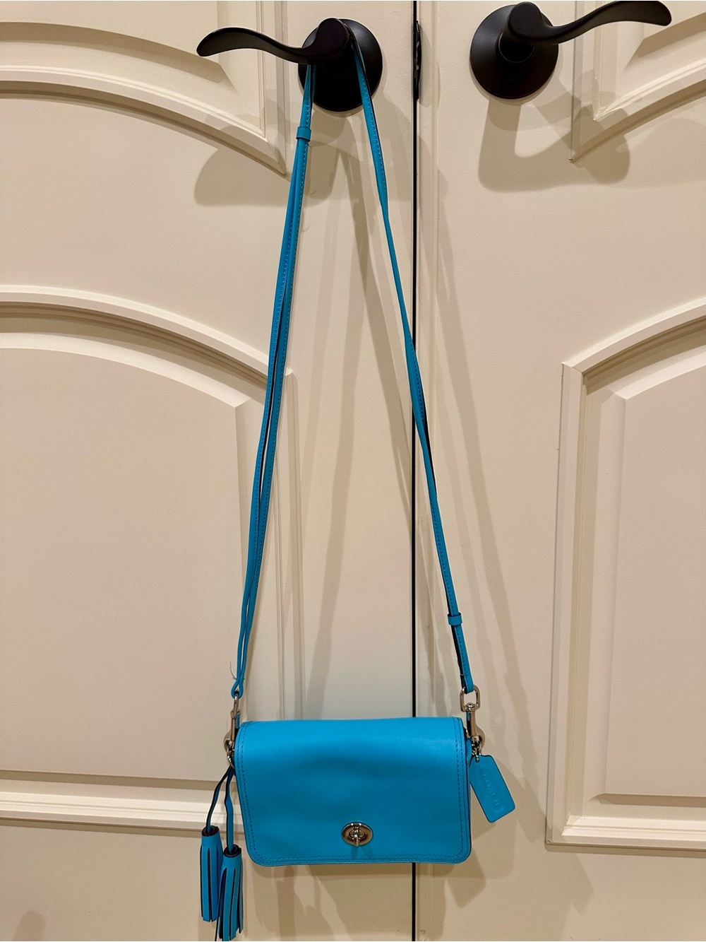 Coach Turquoise Leather Crossbody Bag with Tassel Accent